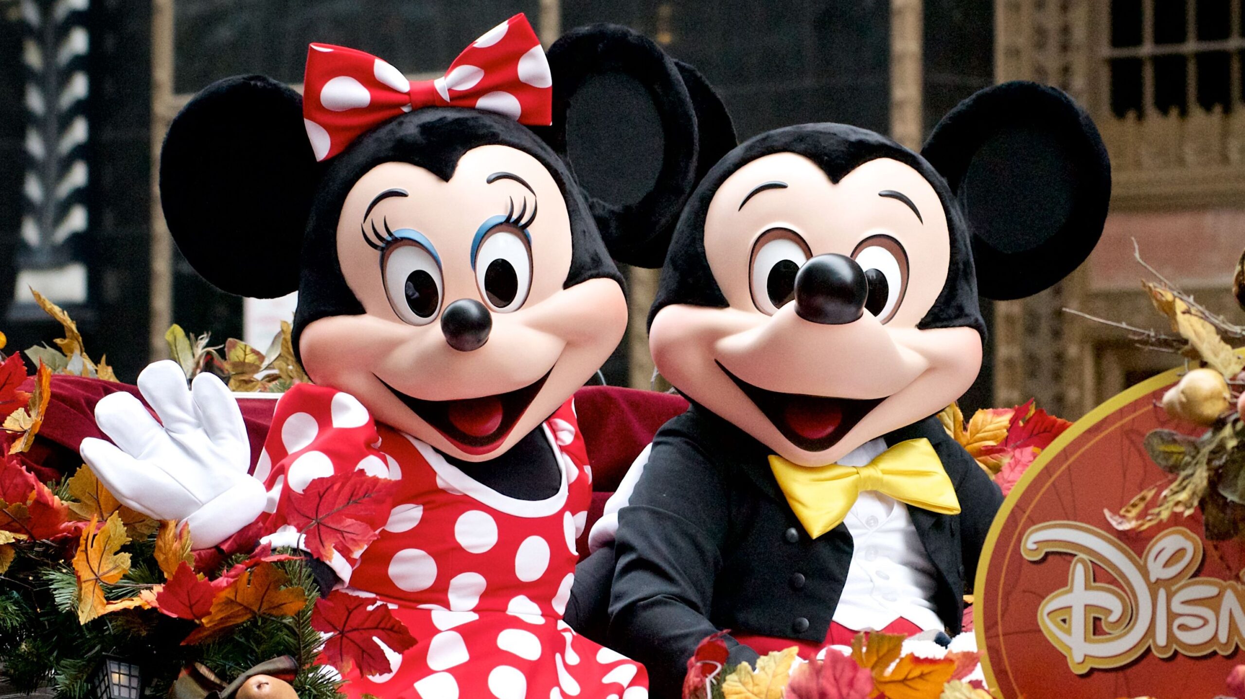 Minnie and Mickey Mouse ride Disney Parks float